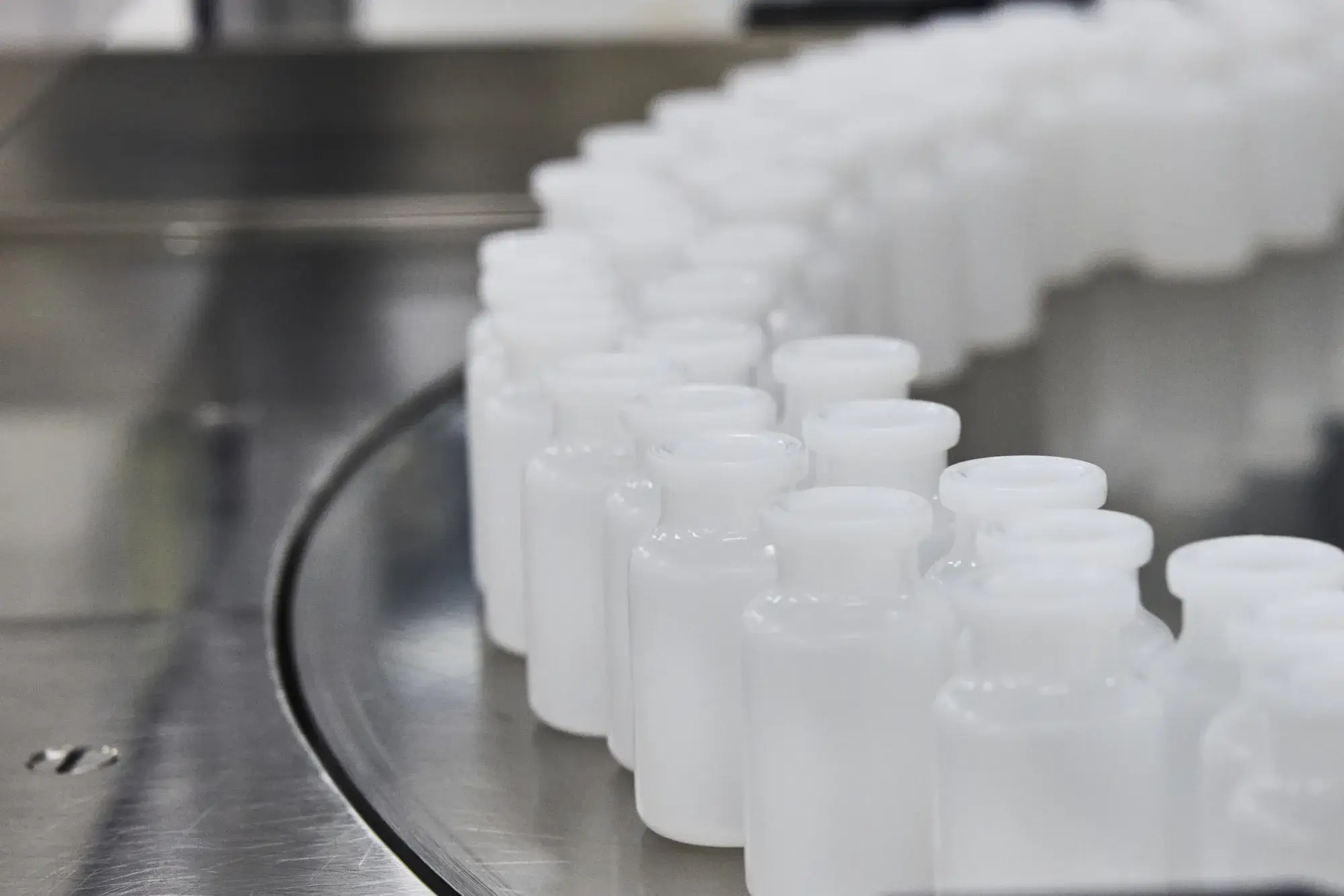 A close up of multiple empty nasal spray bottles