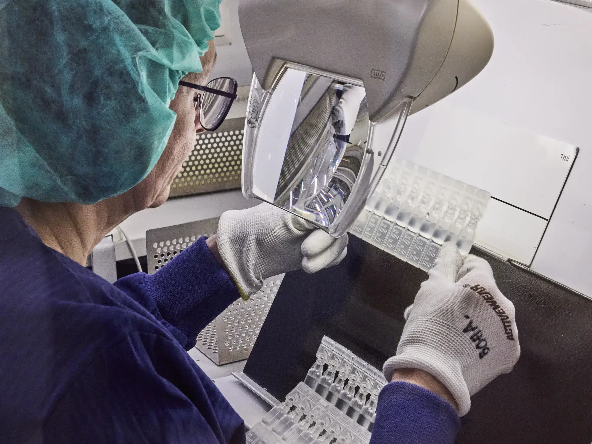 A scientist using science equipment.